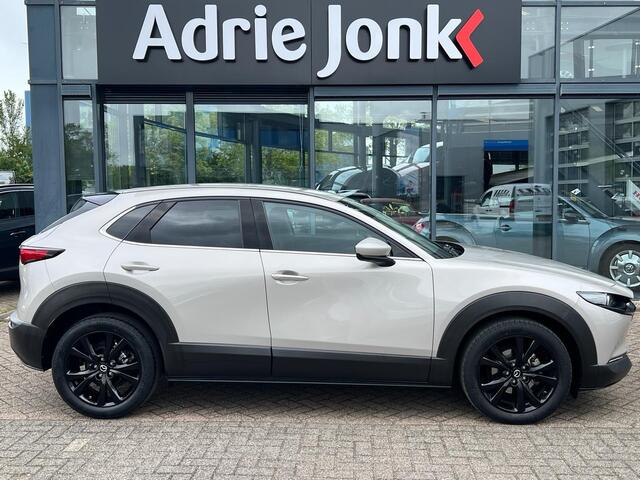 Mazda CX-30 2.0 e-SkyActiv-X M Hybrid Luxury | AUTOMAAT | GARANTIE 4/2029 | APPLE + ANDROID AUTO | STOEL + STUUR VERWARMING | LEDER | ELEKT.A ACHTERKLEP | 1e EIGENAAR | NED. AUTO | Bose AUDIO |