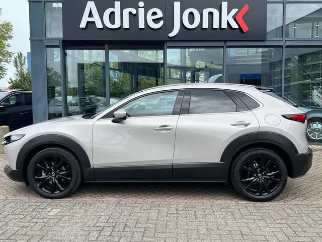 Mazda CX-30 2.0 e-SkyActiv-X M Hybrid Luxury | AUTOMAAT | GARANTIE 4/2029 | APPLE + ANDROID AUTO | STOEL + STUUR VERWARMING | LEDER | ELEKT.A ACHTERKLEP | 1e EIGENAAR | NED. AUTO | Bose AUDIO |