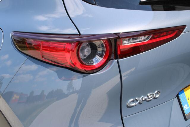 Mazda CX-30 2.0 e-SkyActiv-X M Hybrid Luxury | Adaptieve cruise control | Apple carplay/Android auto | Stoel/stuurverwarming | Trekhaak | Head-up display | Parkeercamera | Memory seat | Bose audio |