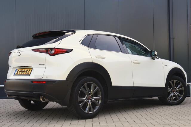 Mazda CX-30 2.0 e-SkyActiv-X M Hybrid 100th Anniversary Automaat | 180pk | 360 camera | HUD | Keyless | Leer | Schuif / Kanteldak | Adaptieve Cruise | Stoelverwarming | Stuurverwarming | Luxury