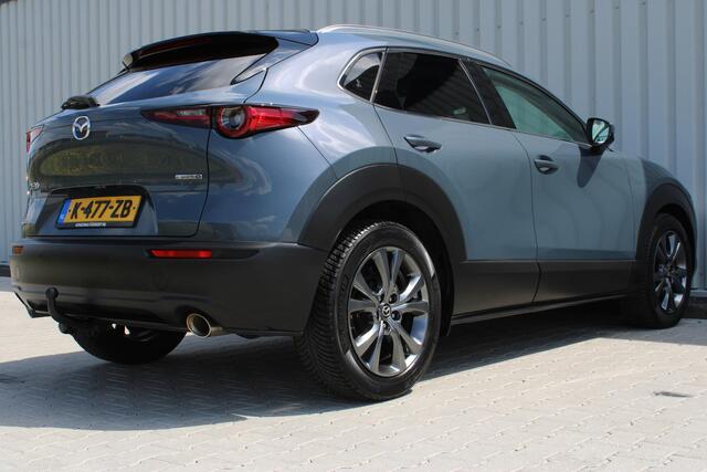 Mazda CX-30 2.0 e-SkyActiv-X M Hybrid Luxury | Incl. 12 maanden garantie | Adaptieve cruise control | Apple carplay/Android auto | Stoel/stuurverwarming | Trekhaak | Head-up display | Parkeercamera | Memory seat | Bose audio |