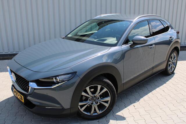 Mazda CX-30 2.0 e-SkyActiv-X M Hybrid Luxury | Incl. 12 maanden garantie | Adaptieve cruise control | Apple carplay/Android auto | Stoel/stuurverwarming | Trekhaak | Head-up display | Parkeercamera | Memory seat | Bose audio |