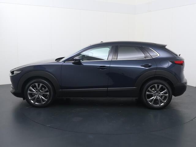 Mazda CX-30 2.0 e-SkyActiv-X M Hybrid Luxury | 187 PK | Adaptive Cruise Control | Achteruitrijcamera | Panoramadak | Bose Audio | Volleder | Head-up Display | Dodehoek detectie | Keyless Entry | Navigatiesysteem | Climate control | LED verlichting | Elektrische achterklep | Stuur- & Stoelverwarming | Parkeersensoren | 18" LM velgen | – foto 2