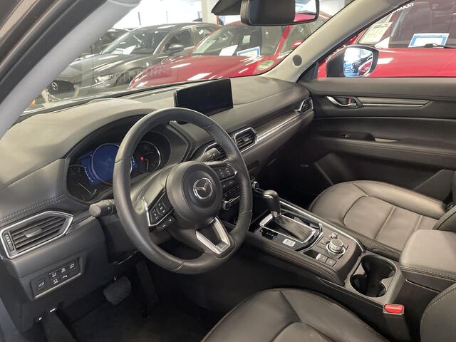 Mazda CX-5 2.0 SkyActiv-G 165 Luxury Automaat, Trekhaak, Leder, Keyblocker, Bose, HUD, Adap. Cruise, Stoelverwarming, Stoelverkoeling, Stuurverwarming, Clima, 360 Camera, Navi, HUD, Bose, LKA, Elektrische klep