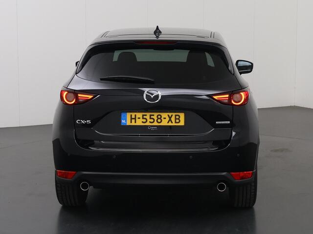 Mazda CX-5 2.0 SkyActiv-G 165 Luxury | 2000kg trekgewicht | Trekhaak | Navigatie | Stoelverwarming/koeling | Ele. verstelbare stoelen + geheugen | 360 Camera | DAB | Apple Carplay/Android Auto | HUD | Bose Audio |