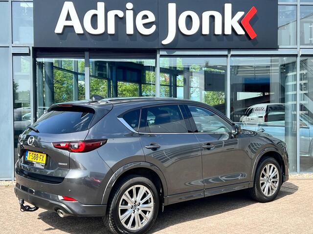 Mazda CX-5 2.0 e-SkyActiv-G M Hybrid 165 Takumi TREKHAAK | LEDER | Bose AUDIO | 360gr. CAMERA | El. A.KLEP | STOELVENTILATIE | STUUR- en STOEL VERWARMING | NED. AUTO | GARANTIE 6-2029 |