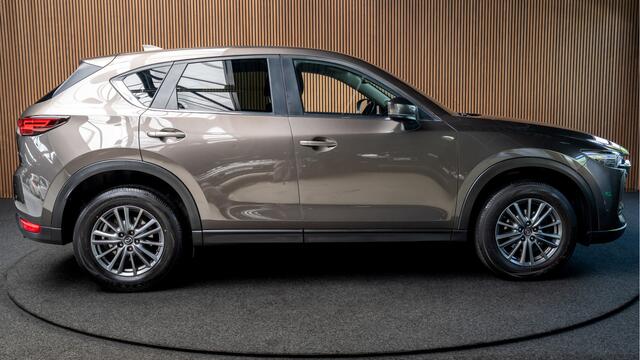 Mazda CX-5 2.0 SkyActiv-G 165 HUD Navi Camera PDC Stuurverw. Stoelverwarming Climate C. Cruise C. Afneembaar trekhaak LM velgen