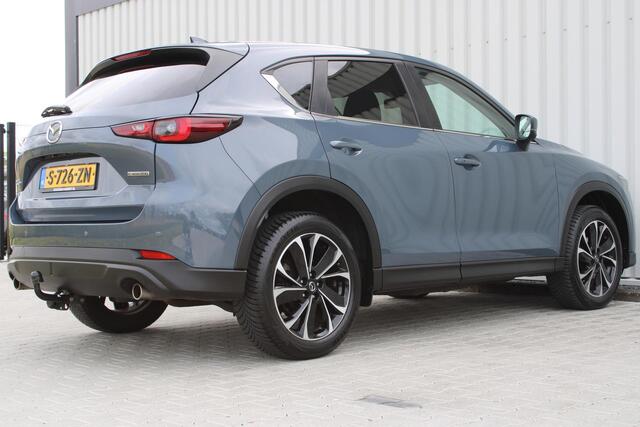 Mazda CX-5 2.0 e-SkyActiv-G M Hybrid 165 Advantage | Incl. 12 maanden garantie | Stuurverwarming | Stoelverwarming | 360° camera | Parkeersensoren | Adaptieve cruise control | Apple Carplay/Android Auto | Trekhaak | Climate Control | Bluetooth |