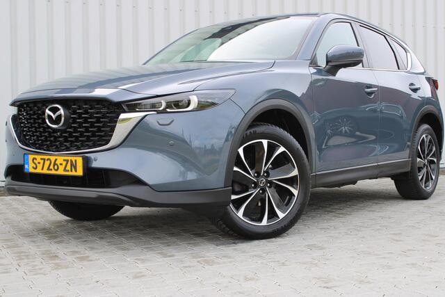 Mazda CX-5 2.0 e-SkyActiv-G M Hybrid 165 Advantage | Incl. 12 maanden garantie | Stuurverwarming | Stoelverwarming | 360° camera | Parkeersensoren | Adaptieve cruise control | Apple Carplay/Android Auto | Trekhaak | Climate Control | Bluetooth |
