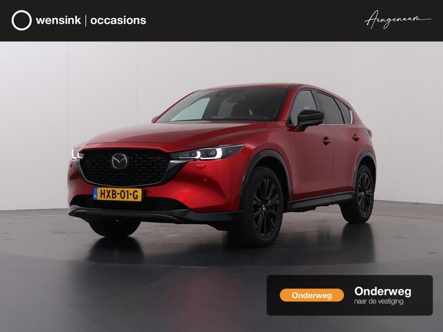 Mazda CX-5 2.0 SkyActiv-G HOMURA 165pk | Trekhaak | Navigatie | 360° Camera | Cruise Control Adaptief | Bose Audio | Winterpakket | Lederen Interieur |