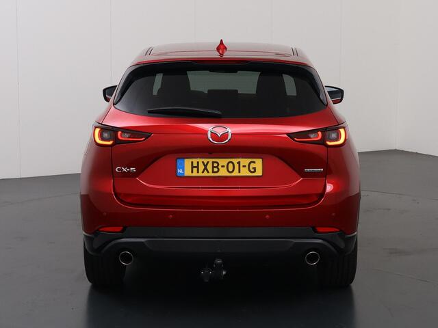 Mazda CX-5 2.0 SkyActiv-G HOMURA 165pk | Trekhaak | Navigatie | 360° Camera | Cruise Control Adaptief | Bose Audio | Winterpakket | Lederen Interieur |