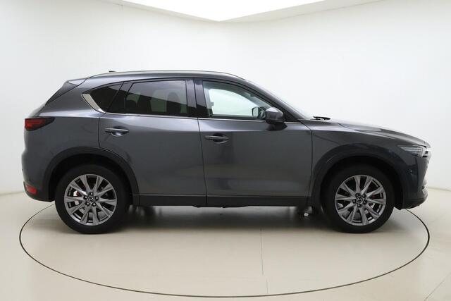 Mazda CX-5 2.0 SkyActiv-G 165 Business Luxury | Cruise control | Climate control | Keyless entry | Verwarmde stoelen voor & achter | Elektrisch bedienbare achterklep | DAB | Apple Carplay/Android Auto