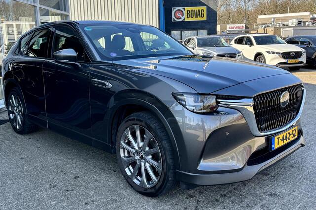 Mazda CX-60 2.5 e-SkyActiv PHEV Exclusive-Line NL-Auto. Dealer Ondh., Trekhaak, Navigatie, Alarm klasse 3, Apple Carplay/ Android Auto, Stoelverwarming, Stuurverwarming, AWD, Plug-in Hybride.