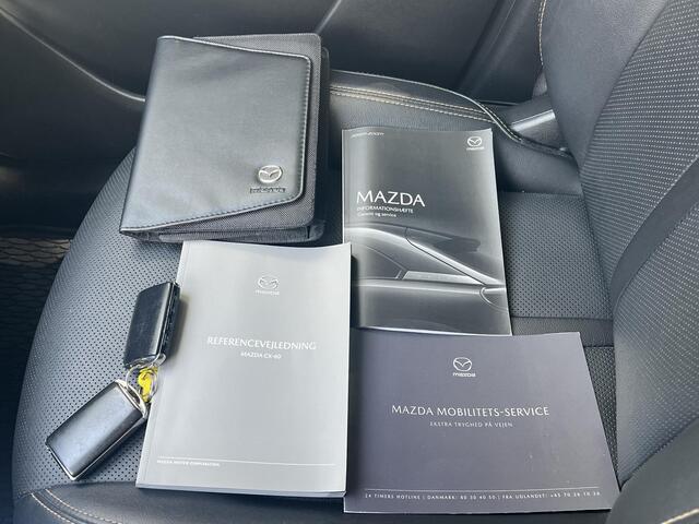Mazda CX-60 2.5 e-SkyActiv PHEV Homura / Leder / 2.500 kg trekgewicht / Camera 360° / Elektrische stoelen, stuur & klep / Stoelventilatie / Stuur-, stoel- & achterbankverwarming / Apple Carplay Android / 19"LM wielen /