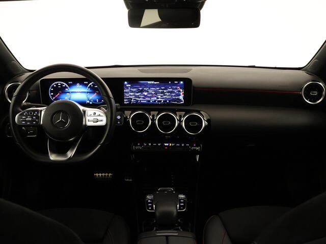Mercedes-Benz A-KLASSE 180 Business Solution AMG | Navigatie | Camera | Pakeersensoren | Stoelverwarming | Cruise Control | Inclusief 24 maanden MB Certified garantie voor Europa.