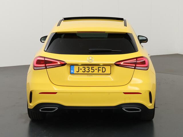 Mercedes-Benz A-KLASSE 180 Business Solution AMG | Panoramadak | Night | Keyless | Achteruitrijcamera | Multibeam Led | Apple carplay/Android auto | Sfeerverlichting | Advanced sound system