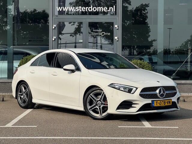 Mercedes-Benz A-KLASSE 200 Business Solution AMG l MBUX l LED High Performance l Camera l Smartphone integratie pakket l Licht en Zicht pakket l Airco l Deelbare Achterbank l PTS l Airconditioning l Spiegel pakket l