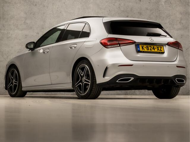 Mercedes-Benz A-KLASSE 180 AMG Sport Automaat (SCHUIFDAK, APPLE CARPLAY, SFEERVERLICHTING, BURMESTER, KEYLESS, LEDER/ALCANTARA, CAMERA, SPORTSTOELEN, STOELVERWARMING, WIDESCREEN, GETINT GLAS, NIEUWSTAAT)