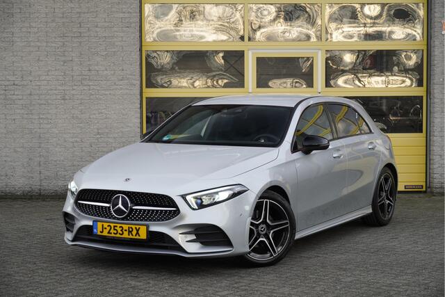 Mercedes-Benz A-KLASSE 180 Automaat! AMG BJ2020 Lmv 18" | Led V+A | Pdc | Navi | Achteruitrijcamera | Dashboard verlichting | Virtual cockpit | Climate control | Cruise control | Sportstoelen | Verwarmde voorstoelen | Zwarte hemel | Extra getint glas