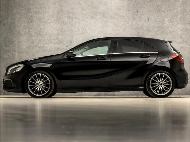 Mercedes-Benz A-KLASSE 180 AMG Sport Automaat (APPLE CARPLAY, GROOT NAVI, CAMERA, LEDER, STOELVERWARMING, SPORTSTOELEN, GETINT GLAS, KEYLESS START, NIEUWE APK, NIEUWSTAAT)