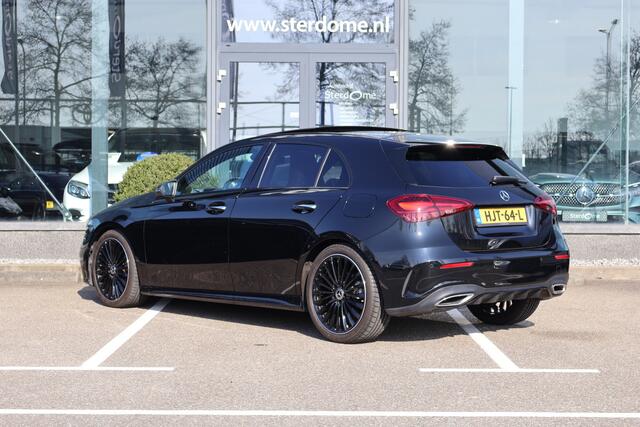 Mercedes-Benz A-KLASSE 180 Business Solution AMG I 2025 I Panorama dak I Multibeam l 360 camera I KEYLESS I Sfeerverlichting I Stoelverwarming I Spaak velgen I I Nightpakket I Nederlandse auto I BTW I