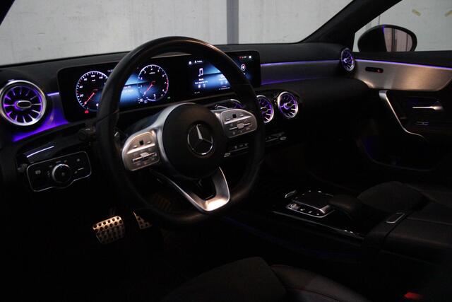Mercedes-Benz A-KLASSE 220 190PK AUTOMAAT BUSINESS SOLUTION AMG | PANORAMA SCHUIF/KANTEL DAK | SFEER VERLICHTING VOOR + ACHTER | STOEL VERWARMING OP BEIDE VOORSTOELEN | MULTIBEAM LED KOPLAMPEN | ACHTERUITRIJ CAMERA | APPLE CARPLAY/ANDROID AUTO | NAVIGATIE | CRUISE CONTROL | NIG