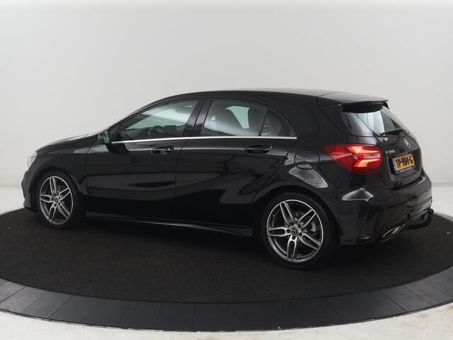 Mercedes-Benz A-KLASSE 180 Business Solution AMG | Leder/alcantara | Stoelverwarming | Cruise control | Navigatie | Bluetooth | Camera | Park assist | Trekhaak
