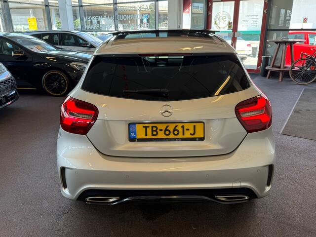 Mercedes-Benz A-KLASSE 180 AMG White Art | Automaat | Panoramadak | Achteruitrijcamera | Origineel Nederlands | Cruise control | Climate control | Adaptief onderstel | 18''INCH AMG | Navigatie
