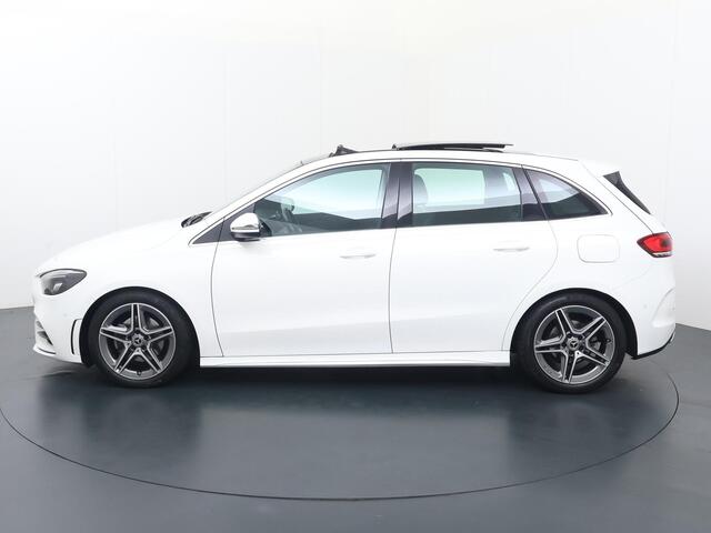 Mercedes-Benz B-KLASSE 180 Business Solution AMG | Automaat | Panoramadak | Flippers | Multifunctioneel stuurwiel | Cruisecontrol | Spraakbediening | Bluetooth | Stoelverwarming | Deurvergrendeling | Climate | Dab+ | Navigatie | Apple Carplay - Androidauto | Parkeersensoren | A