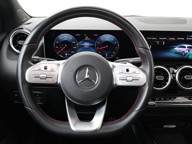 Mercedes-Benz B-KLASSE 180 Business Solution AMG | Automaat | Panoramadak | Flippers | Multifunctioneel stuurwiel | Cruisecontrol | Spraakbediening | Bluetooth | Stoelverwarming | Deurvergrendeling | Climate | Dab+ | Navigatie | Apple Carplay - Androidauto | Parkeersensoren | A