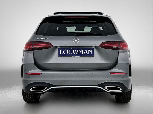 Mercedes-Benz B-KLASSE 250 e Business Solution AMG | Premium Plus pakket | Trekhaak | Warmtewerend, donkergetint glas | Winter pakket | Head-up display | Sierelementen in openporig lindehout zwart | 19 inch multispaaks velgen |
