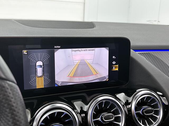 Mercedes-Benz B-KLASSE 180 Business Solution AMG Panoramadak | Lichtmetalen velgen | MBUX wide screen | navigatie | Parking support | Sfeerverlichting | Inclusief 24 maanden MB Certified garantie voor Europa.