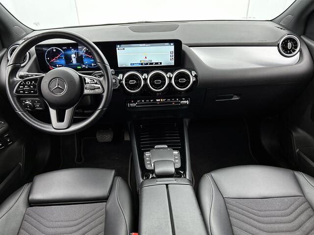 Mercedes-Benz B-KLASSE 250 e Plug-In Hybride Trekhaak | Ledkoplampen | Apple CarPlay | Parkeerpakket met achteruitrijcamera | Stoelverwarming. Inclusief 24 maanden MB Certified garantie voor Europa.