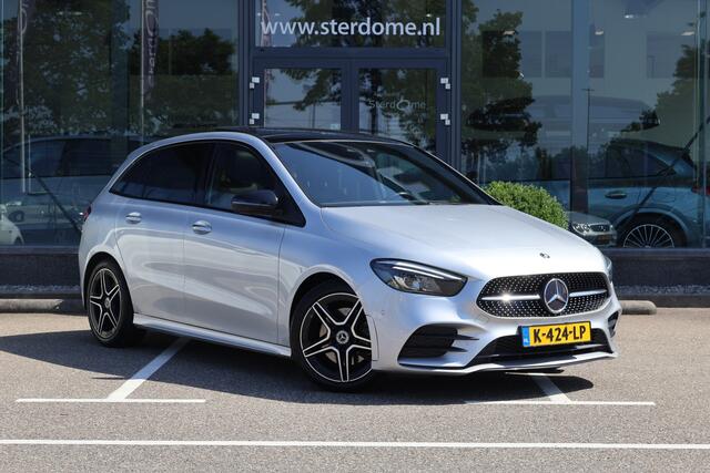 Mercedes-Benz B-KLASSE 220 AMG Line l Panoramadak l Nightpakket l LED High Performance l MBUX l Camera l Smartphone Integratie l Stoelverwarming l PTS l Airconditioning l Elektr. bedienbare Achterklep l