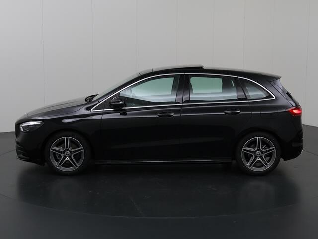 Mercedes-Benz B-KLASSE 180 Business Solution AMG | Panoramadak | Winter pakket | Memory stoelen | Trekhaak | Parkeercamera | Sfeerverlichting |