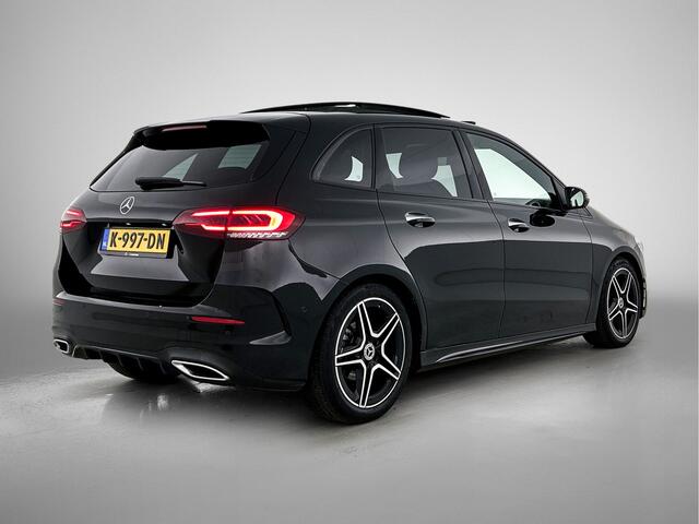 Mercedes-Benz B-KLASSE 180 Business Solution AMG AMG Line | Night Pakket | Panorama Schuif-Kanteldak | Memory voorstoelen | Achteruitrijcamers. Inclusief 24 maanden MB Certified garantie voor Europa.
