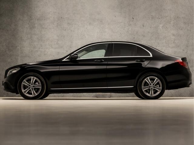 Mercedes-Benz C-KLASSE 180 Business Sport 157Pk Automaat (VIRTUAL COCKPIT, APPLE CARPLAY, GROOT NAVI, SFEERVERLICHTING, MEMORY SEATS, BURMESTER, STOELVERWARMING, MATRIX LED, CAMERA, NIEUWSTAAT)