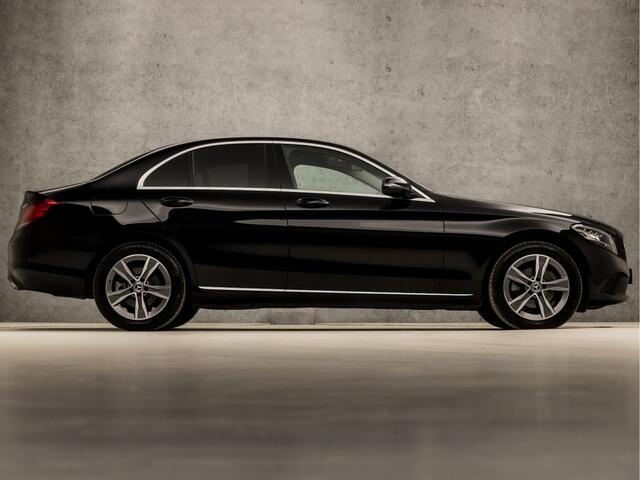 Mercedes-Benz C-KLASSE 180 Business Sport 157Pk Automaat (VIRTUAL COCKPIT, APPLE CARPLAY, GROOT NAVI, SFEERVERLICHTING, MEMORY SEATS, BURMESTER, STOELVERWARMING, MATRIX LED, CAMERA, NIEUWSTAAT)