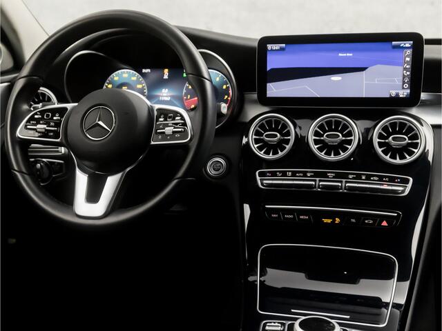 Mercedes-Benz C-KLASSE 180 Business Sport 157Pk Automaat (VIRTUAL COCKPIT, APPLE CARPLAY, GROOT NAVI, SFEERVERLICHTING, MEMORY SEATS, BURMESTER, STOELVERWARMING, MATRIX LED, CAMERA, NIEUWSTAAT)