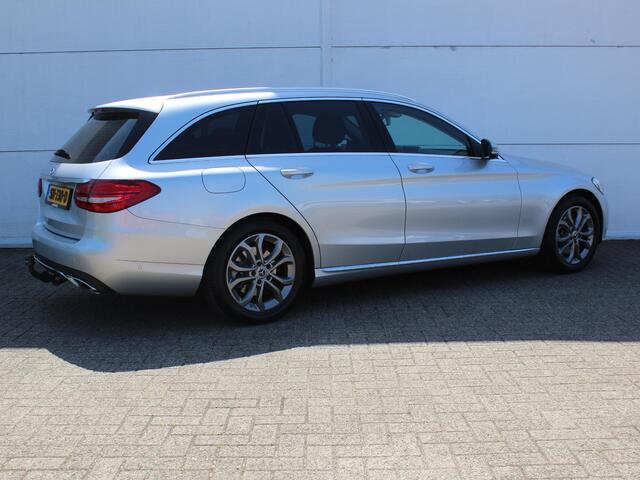 Mercedes-Benz C-KLASSE Estate 180 Premium AUTOMAAT / Trekhaak (1800 KG) / Navigatie / Parkeer Pakket / Stoelverwarming Voor / Elektrisch Bedienbare Achterklep /