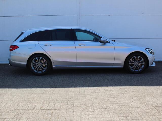 Mercedes-Benz C-KLASSE Estate 180 Premium AUTOMAAT / Trekhaak (1800 KG) / Navigatie / Parkeer Pakket / Stoelverwarming Voor / Elektrisch Bedienbare Achterklep /