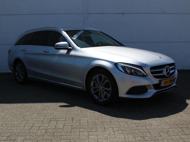 Mercedes-Benz C-KLASSE Estate 180 Premium AUTOMAAT / Trekhaak (1800 KG) / Navigatie / Parkeer Pakket / Stoelverwarming Voor / Elektrisch Bedienbare Achterklep /