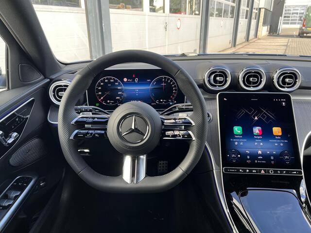 Mercedes-Benz C-KLASSE Estate 300 e Business Solution AMG | Night Pakket | Panoramadak | Trekhaak | 360° Camera | DISTRONIC Afstandsassistent | Dodehoekassistent | Sierdelen Lindehout Antraciet | Elektrisch Verstelbare Stoelen + Memory | Apple CarPlay | Android Auto