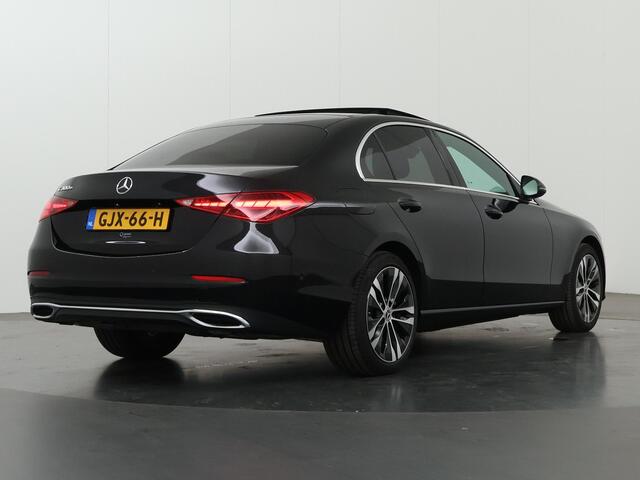 Mercedes-Benz C-KLASSE 300 e Luxury Line | Panorama-dak | Donkergetint glas | Electrische stoelen met geheugen | Sfeerverlichting