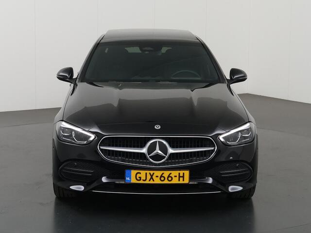 Mercedes-Benz C-KLASSE 300 e Luxury Line | Panorama-dak | Donkergetint glas | Electrische stoelen met geheugen | Sfeerverlichting
