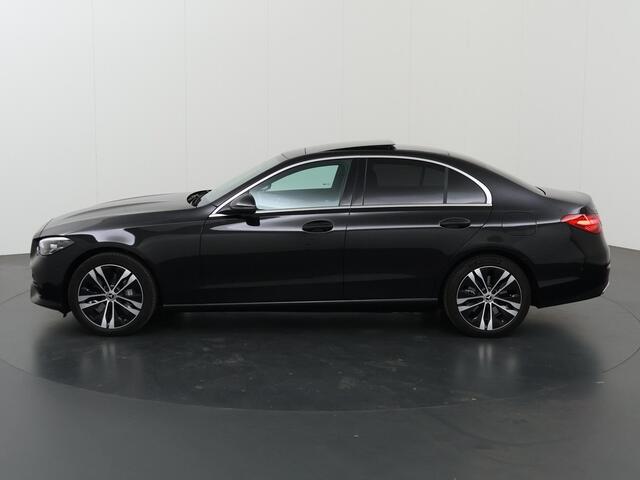 Mercedes-Benz C-KLASSE 300 e Luxury Line | Panorama-dak | Donkergetint glas | Electrische stoelen met geheugen | Sfeerverlichting