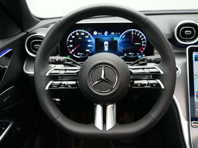 Mercedes-Benz C-KLASSE Estate 300 e AMG Night Plug In Hybrid 320pk Dealer O.H. PHEV | Panodak | Trekhaak af Fabriek | Alcantara Sportstoelen Verwarmd | Sfeerverlichting | Navigatie | Apple Carplay | Virtual | Camera | DAB |
