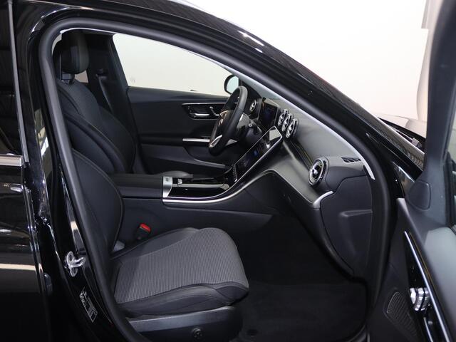 Mercedes-Benz C-KLASSE Estate 300 e Business Line | Panoramadak | Verwarmd stuur | Memory stoelen | Getint glas |