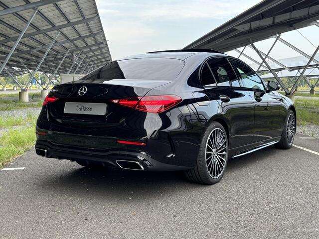 Mercedes-Benz C-KLASSE 300 e Business Solution AMG | Night | Panoramadak | Digital light | Memory stoelen | 19" Multispaaks velgen | Sfeerverlichting |