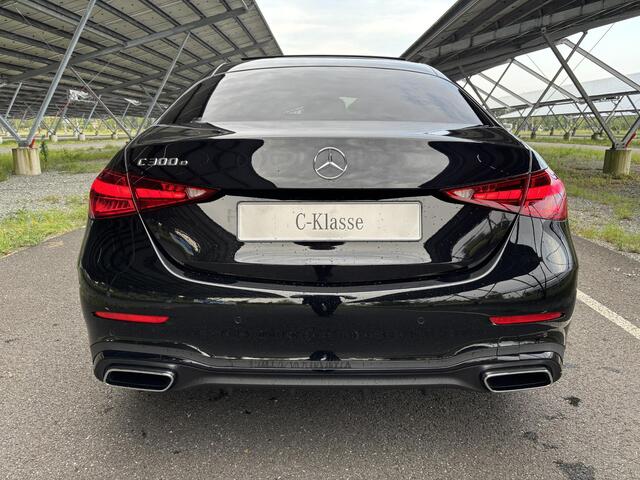 Mercedes-Benz C-KLASSE 300 e Business Solution AMG | Night | Panoramadak | Digital light | Memory stoelen | 19" Multispaaks velgen | Sfeerverlichting |